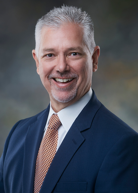 photo portrait of a man in a blue suit