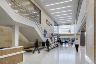 Hospital lobby with patients and visitors moving about