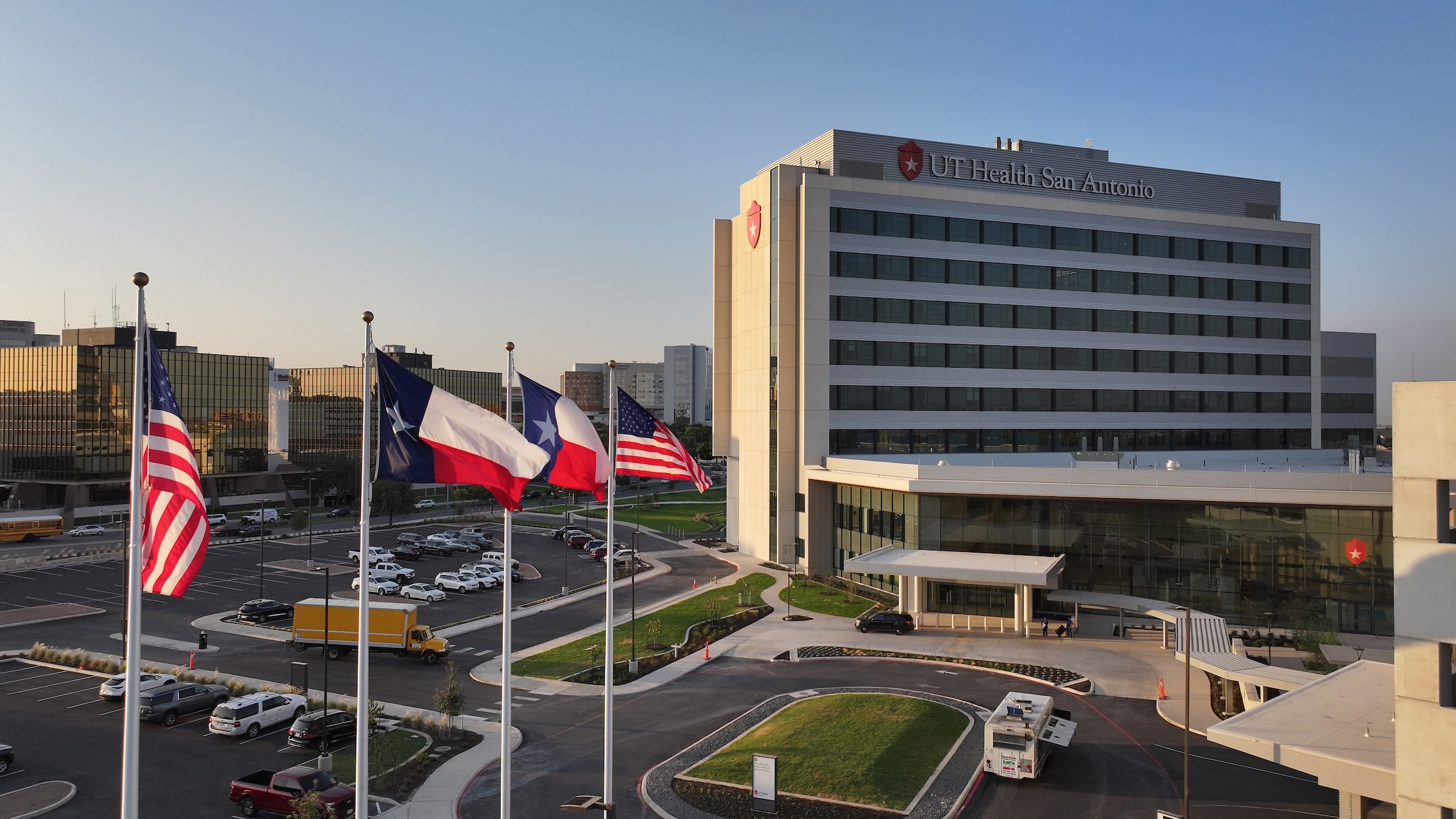 Hospital exterior with flags