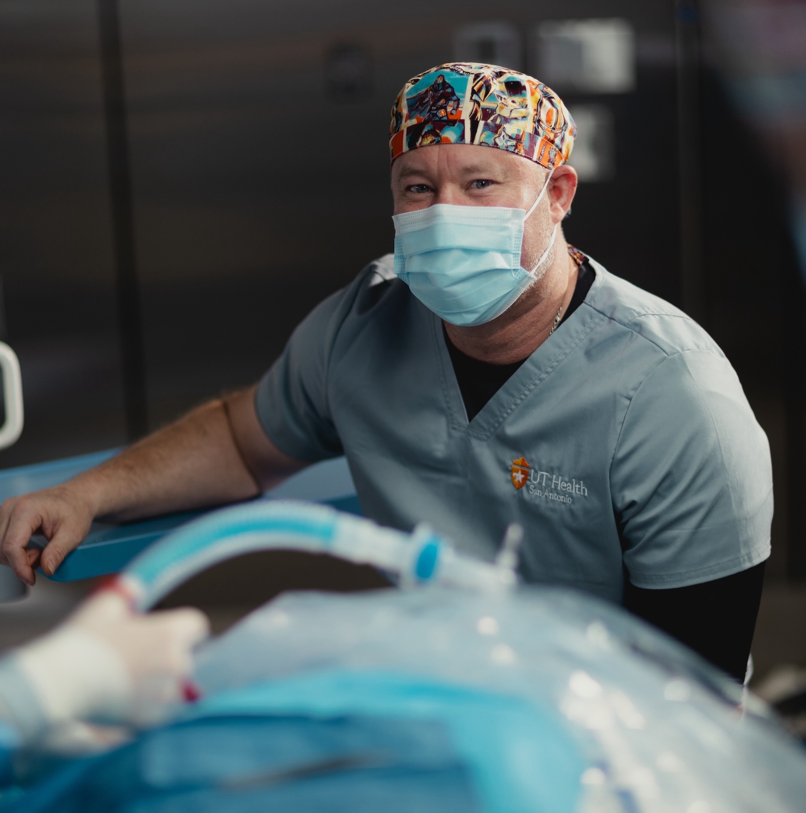 Anesthesiologist smiles during operation