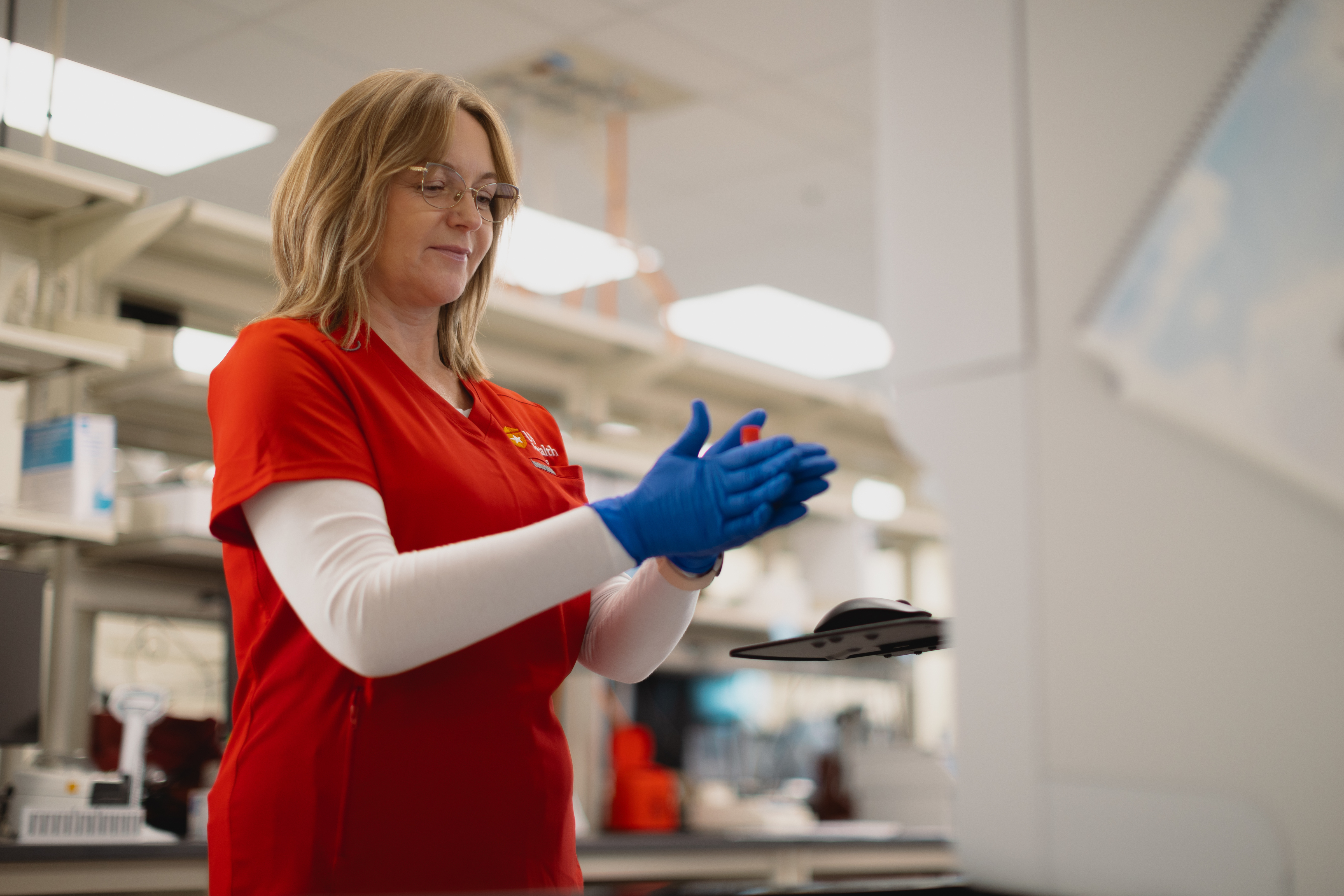 Lab tech prepares blood sample for testing